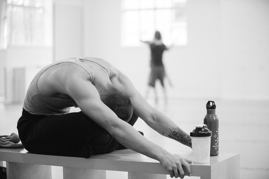 Franco Nieto of Northwest Dance Project stretches before rehearsal.